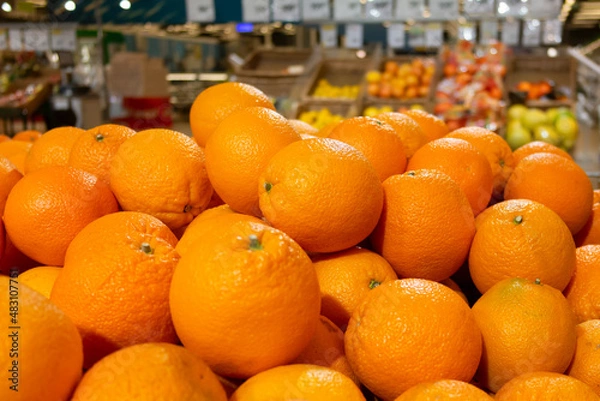 Fototapeta A lot of oranges in supermarket