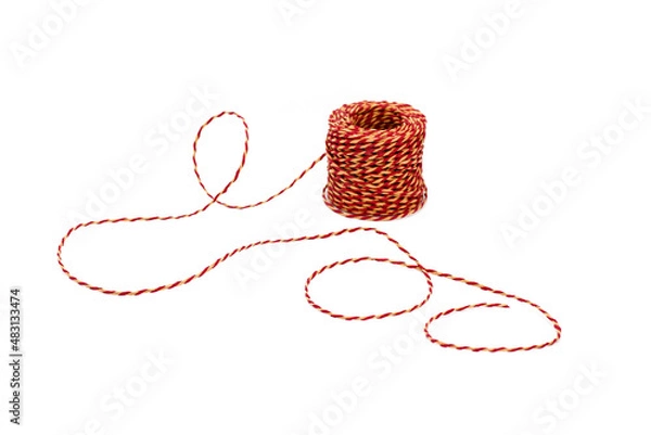 Fototapeta Red and yellow twine isolated on white background. cute and classic twine features a colors of red and yellow twisted together