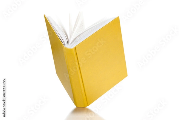 Obraz Open yellow cover book on white background