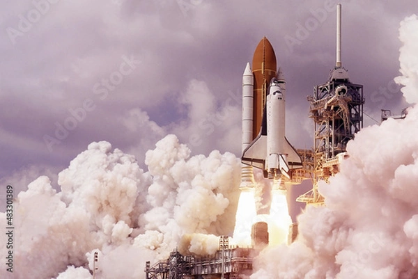 Fototapeta The launch of the space shuttle. With fire and smoke. Against the background of the starry sky. Elements of this image were furnished by NASA