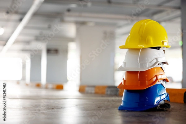 Fototapeta Multicolored Safety Construction Worker hardhat. Teamwork of construction team must have quality. Whether it is engineering, construction workers. safe helmet at work. Concept industry.