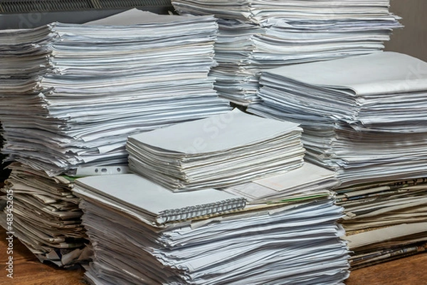 Fototapeta pile of paper documents in the office, paper trash, waste paper