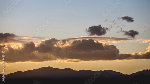 Fototapeta sunset in the mountains