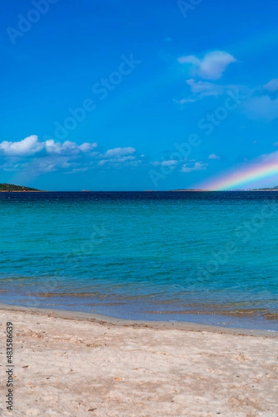 Fototapeta Tavolara Island, scenic view of island and full rainbow in a unique moment