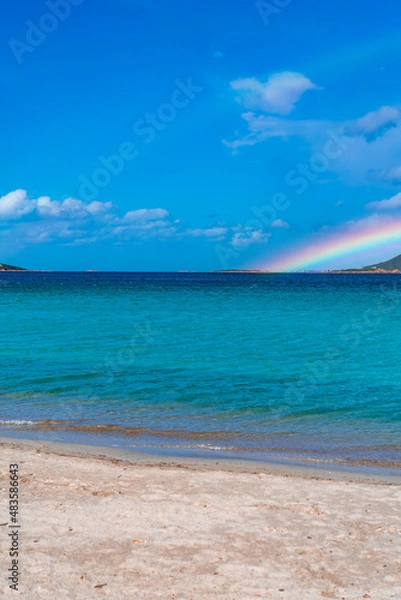 Fototapeta Tavolara Island, scenic view of island and full rainbow in a unique moment