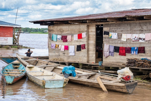 Fototapeta Typical atmosphere on the edge of the Amazon River At Santa Rosa de Yavari, Amazon, Peru.
