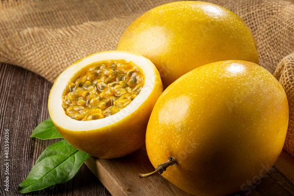 Obraz Yellow passion fruit sliced ​​on the table.