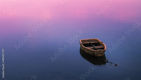 Obraz minimalist photo of a docked fishing boat, waiting for the tide to rise. San Vicente de la Barquera. Cantabria, Spain.