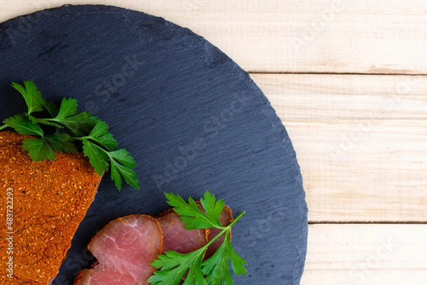 Obraz Carpaccio with spices on a slate plate