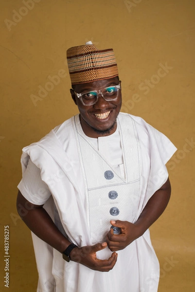 Obraz A Traditionally Dressed Northern Business Man in Glasses Laughing and in Joy