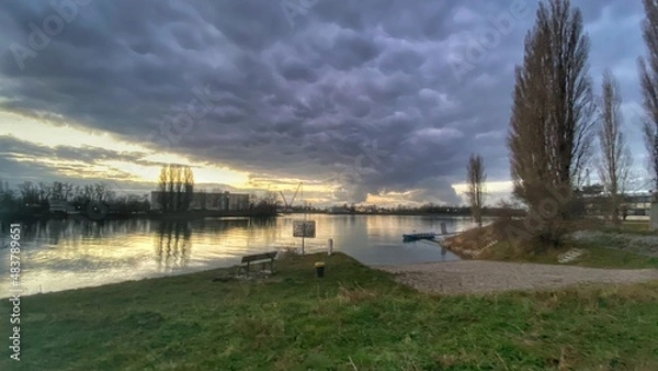 Fototapeta sunset over the river