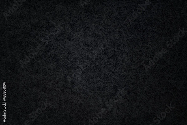 Fototapeta Texture of black wood veneer with vignette. Macro photo.