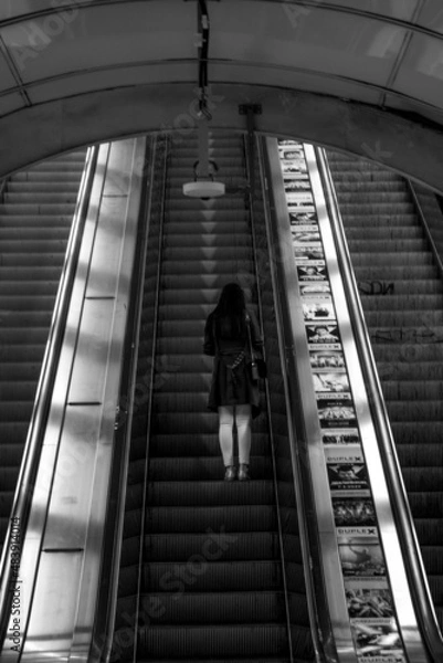 Obraz Woman on escalator