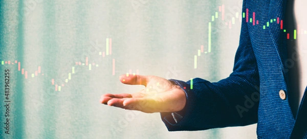 Fototapeta a successful investor, trader, manipulates the direction of the price of stocks, securities, the concept of investment and management, a close-up of the trader's hands