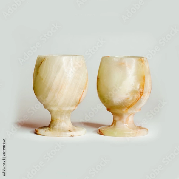 Fototapeta two glasses of onyx isolated on white background.