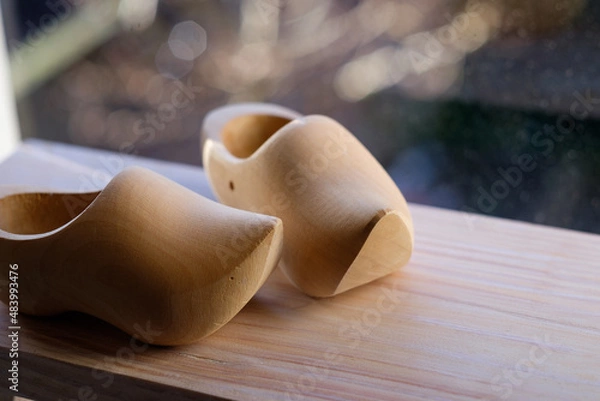 Fototapeta Small clogs near window