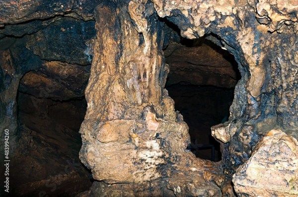 Fototapeta August 25, 2021. Simferopol region, Republic of Crimea. An excursion group of tourists enters the Red Caves.