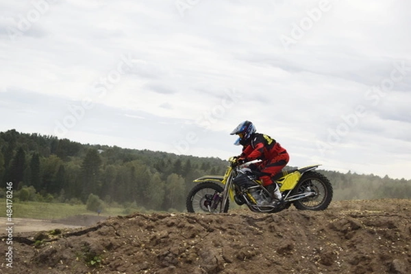 Obraz motocross bikers on motorcycles with carrycot