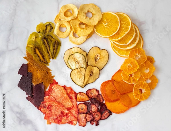 Fototapeta various multicolored dried fruits, top view