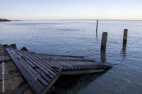Fototapeta Seascape with water, beach, clouds and sky