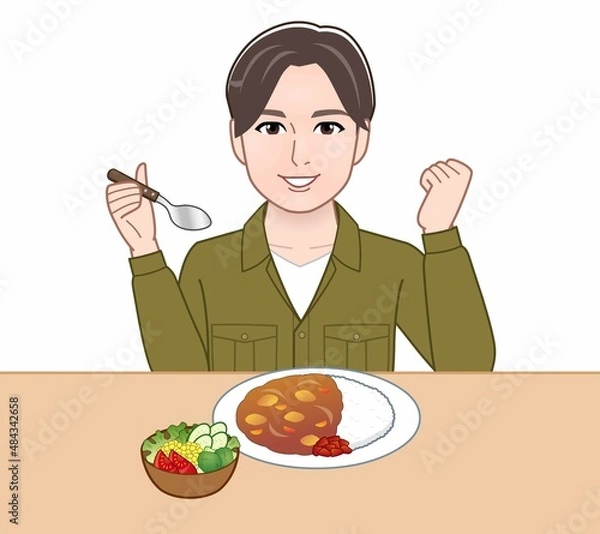 Fototapeta 食事をしている若い男性