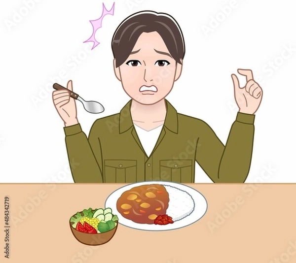 Fototapeta 食事をしている若い男性