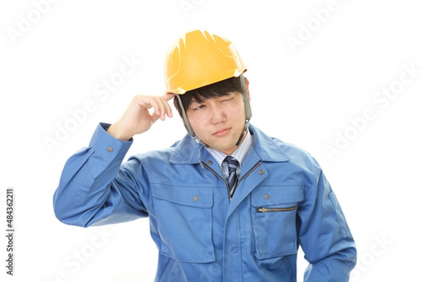 Fototapeta 疲れた男性労働者