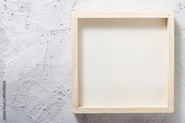 Obraz Wooden frame, box on a concrete wall Abstract background