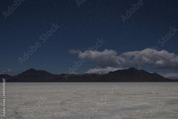 Obraz night sky and clouds over salt flat