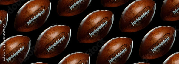 Obraz american football balls on black background