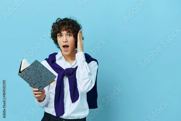 Fototapeta guy education with notepad hand gesture isolated backgrounds