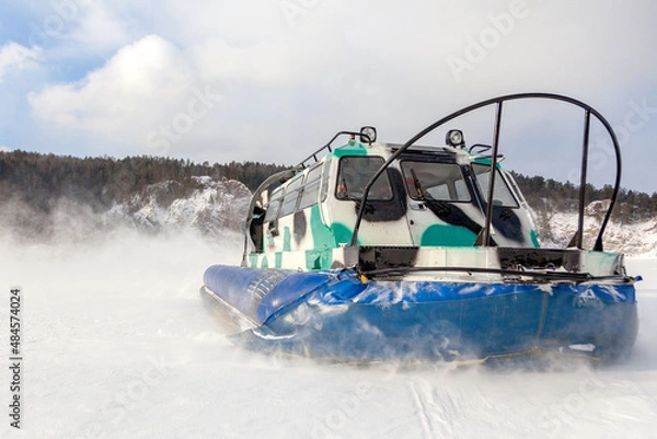 Fototapeta Hovercraft for tourist trips in winter in beautiful natural places