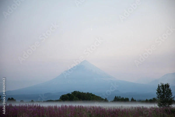 Fototapeta The active Kamchatka Volcano Klyuchevskaya Sopka at dawn