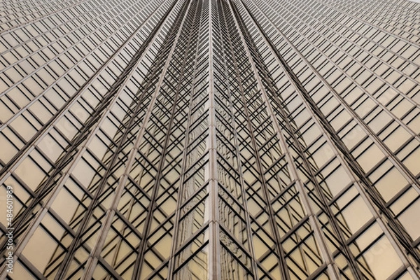 Fototapeta Perspective narrows in this symmetrical image of lines and reflections.