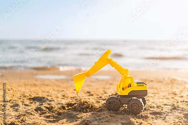 Obraz Toy excavator on the beach with copy space