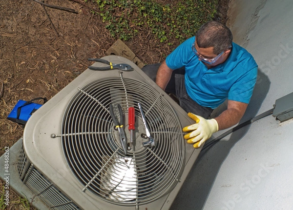 Obraz Hispanic air conditioning technician
