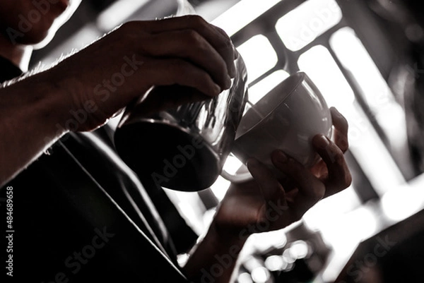 Obraz person makes coffee