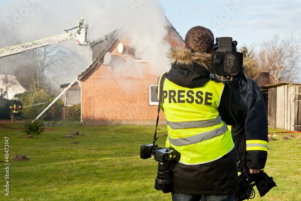 Fototapeta TV interview at house fire