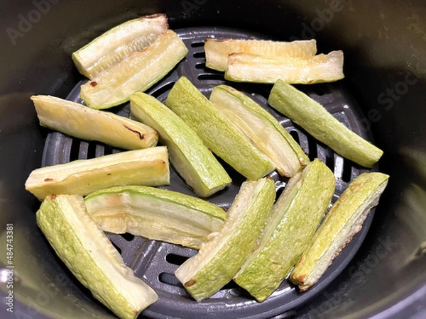 Obraz zucchini in a pan