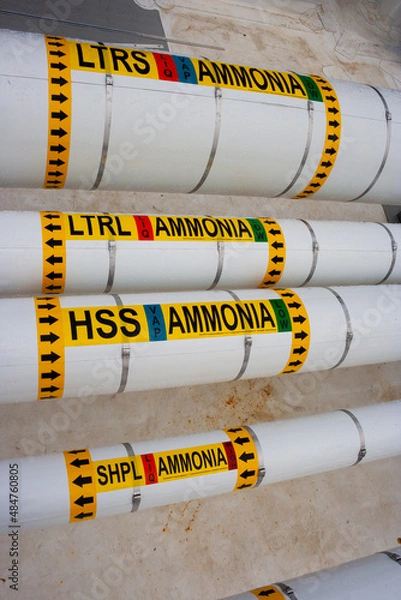 Fototapeta PSM labels on ammonia piping