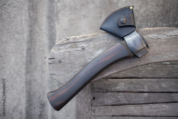 Fototapeta carving axe on table