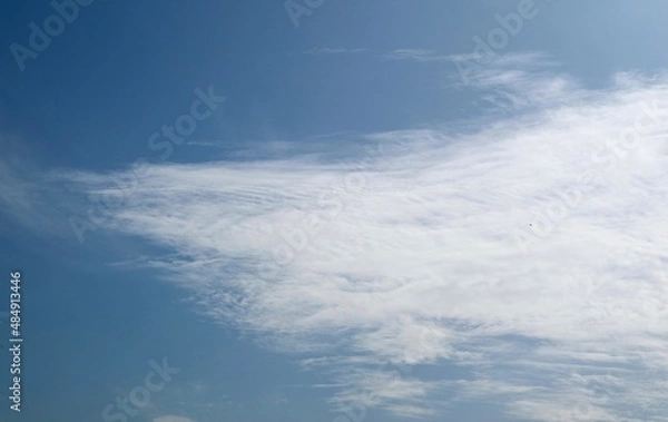 Obraz blue sky with white clouds