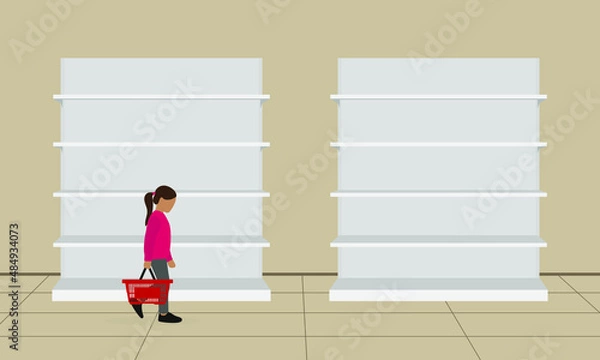 Obraz A little girl with an empty grocery basket in her hand walks past the empty shelves in the store