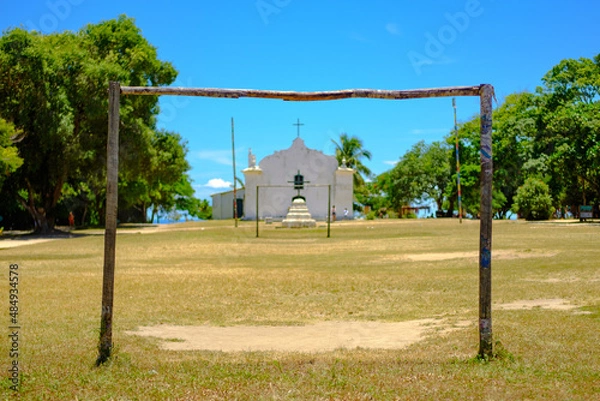 Obraz Soccer posts in front of old church. Trancoso, Bahia, Brazil.
