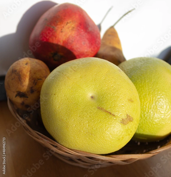 Fototapeta A Basket Of Assorted Fruits