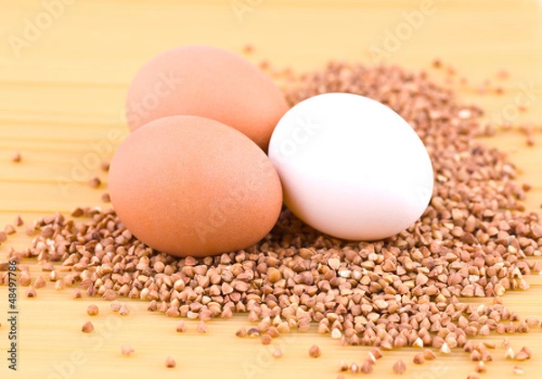 Obraz Three eggs, buckwheat and spaghetti