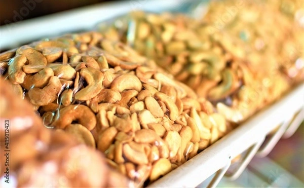 Fototapeta Roasted cashew nuts on display in a local store in the Palawan island of Coron in the Philippines