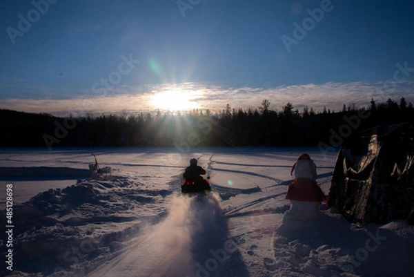 Obraz Sunrise snowmobiler