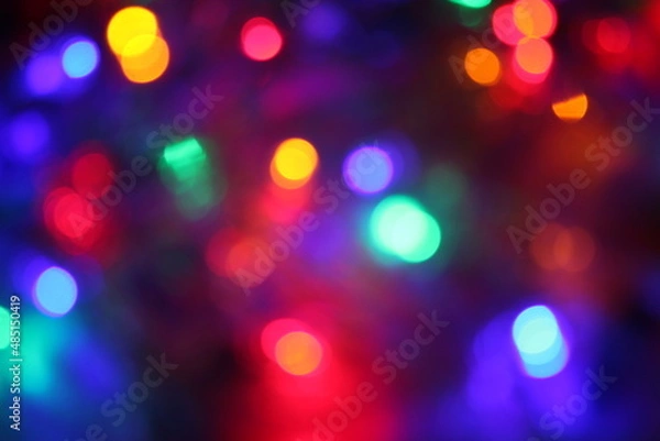 Fototapeta Bokeh light generated from christmas lights.