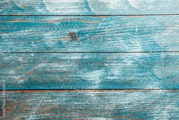 Fototapeta Vintage colored wood background texture with knots and nail holes. Old painted wood wall. Brown abstract background. Vintage wooden dark horizontal boards. Front view with copy space